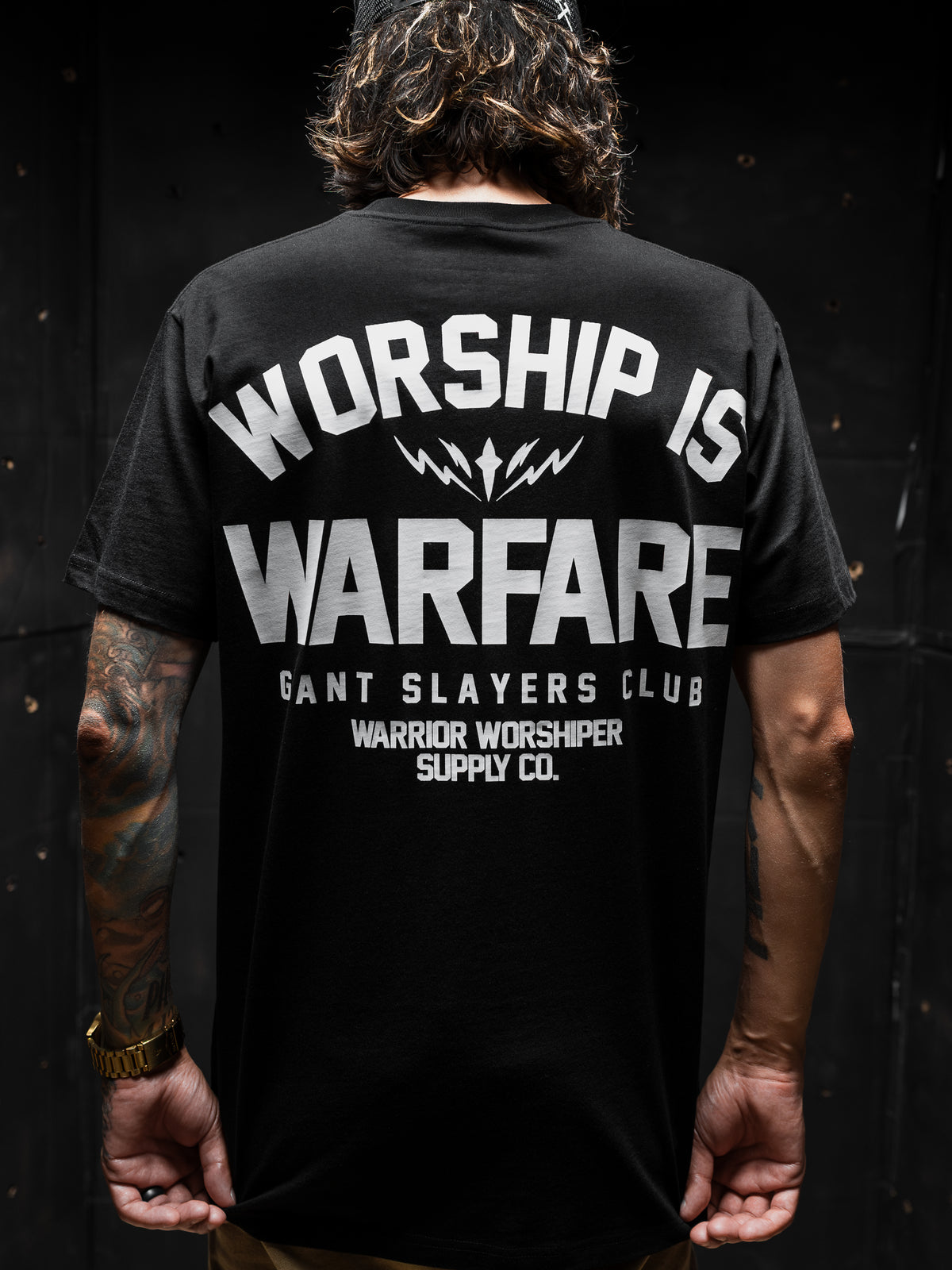 FLAGSHIP WORSHIP IS WARFARE PREMIUM STANDARD ISSUE TEE IN BLACK