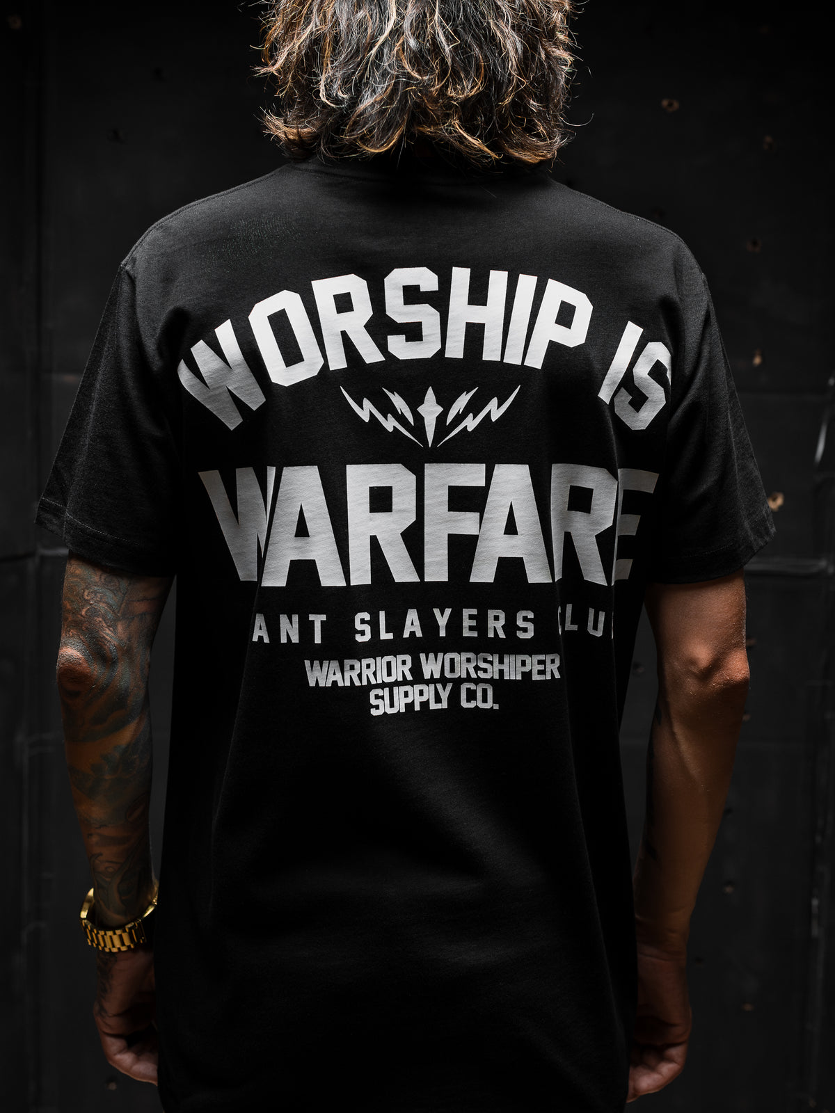 FLAGSHIP WORSHIP IS WARFARE PREMIUM STANDARD ISSUE TEE IN BLACK