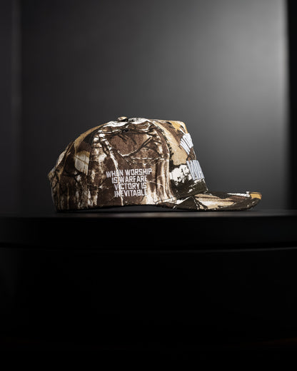 [NEW] "WORSHIP IS WARFARE" TREE CAMO HAT (LMTD DROP 001)