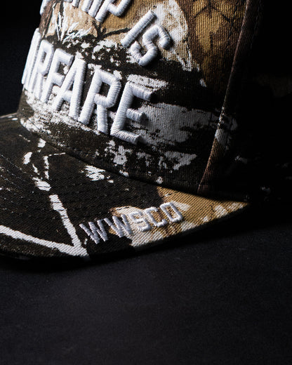 [NEW] "WORSHIP IS WARFARE" TREE CAMO HAT (LMTD DROP 001)